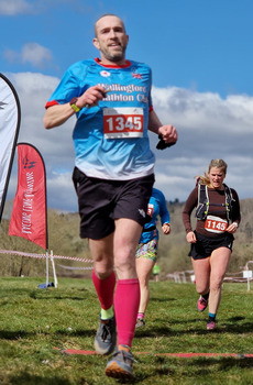 This photo is of Colin Wood. It was taken by Racing Line Running